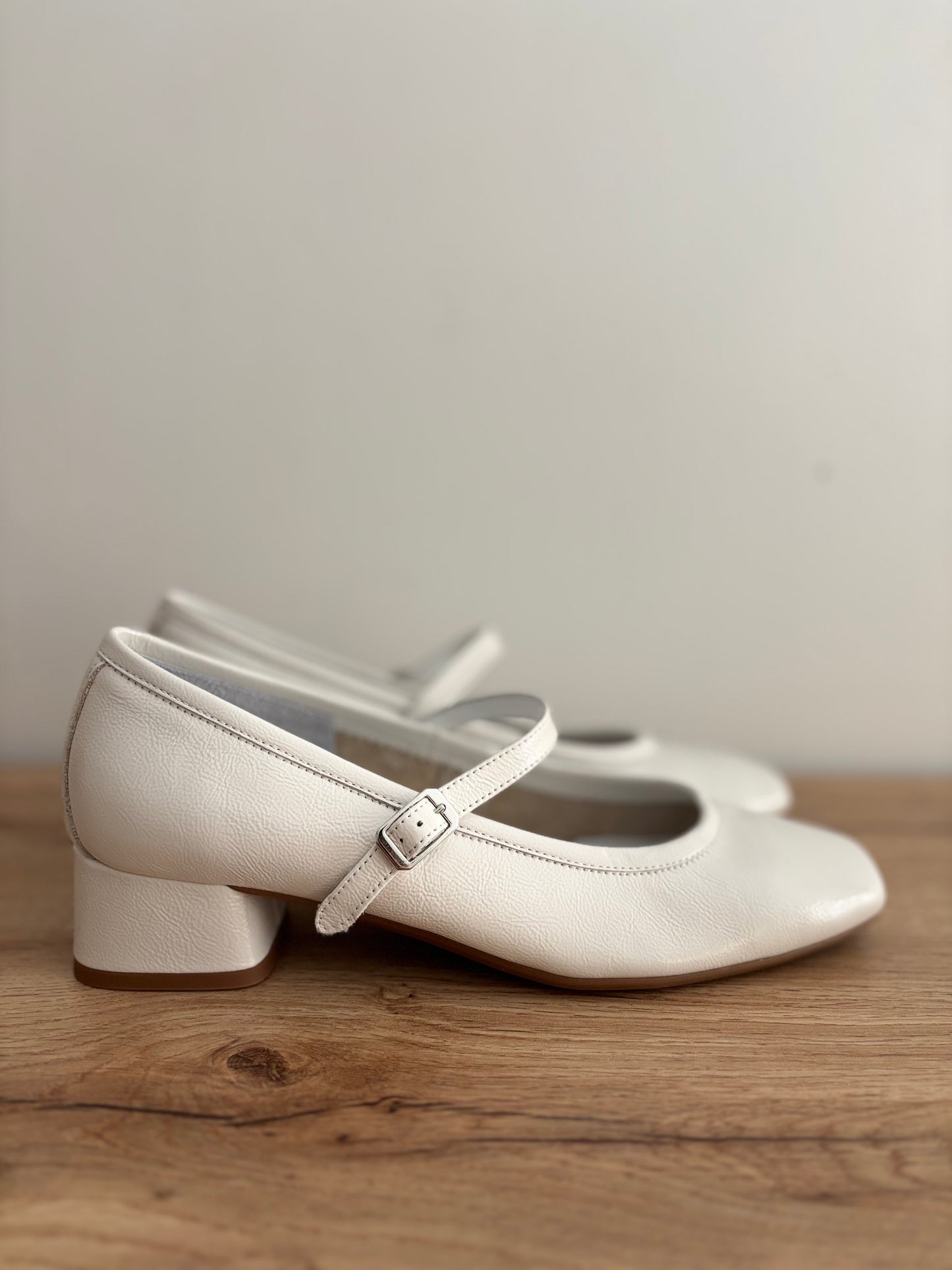 KELLY NAPLACK OFF WHITE